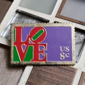 Love 8 cent lapel pin